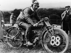 A Man Dressed in Leathers on a Harley-Davidson