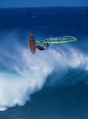 Person Windsurfing in the Sea